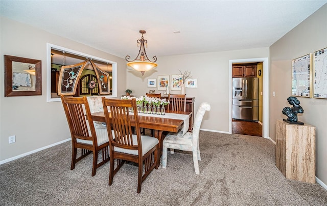 dining area with carpet