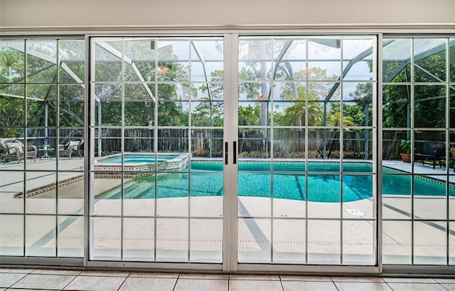 view of swimming pool with an in ground hot tub