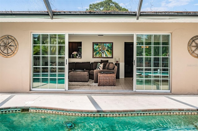 view of pool with a lanai and a patio area