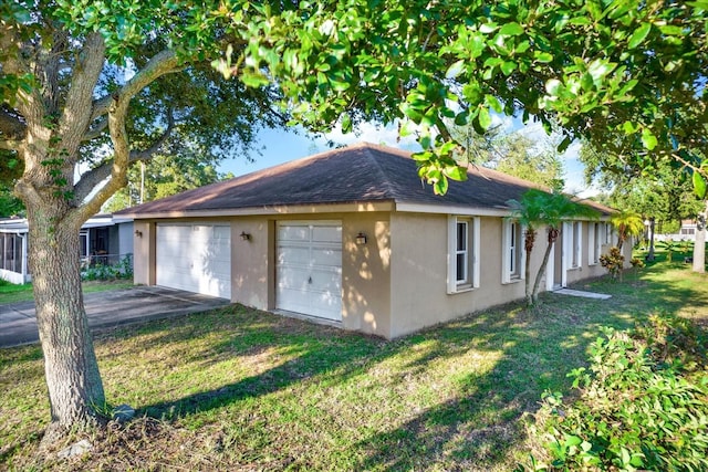 view of side of home featuring a yard