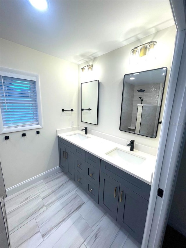 bathroom with vanity and walk in shower