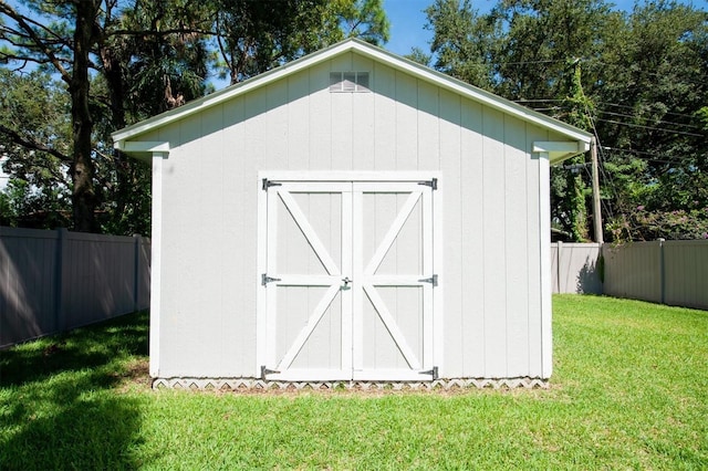 view of outdoor structure featuring a yard