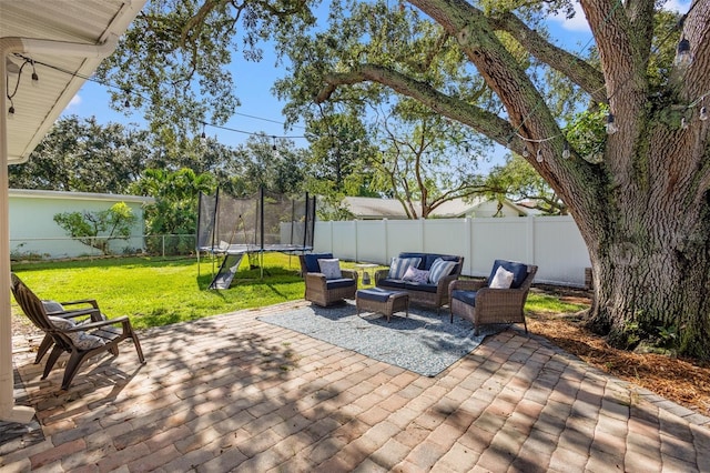 view of patio featuring an outdoor living space and a trampoline