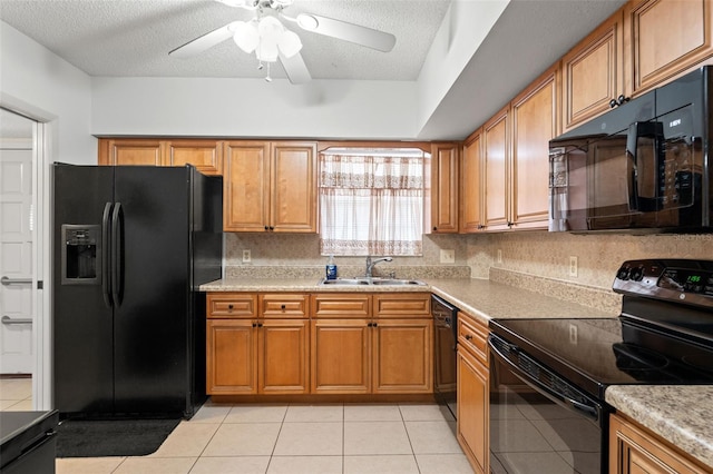 kitchen with ceiling fan, decorative backsplash, light tile patterned floors, sink, and black appliances