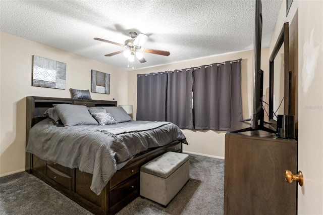 carpeted bedroom with a textured ceiling and ceiling fan