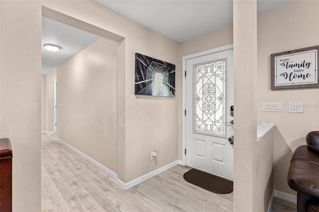 entrance foyer with light wood-type flooring