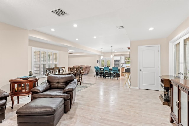 living room featuring light hardwood / wood-style floors