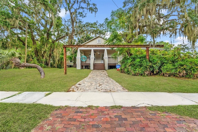 view of front of home featuring a front yard and covered porch