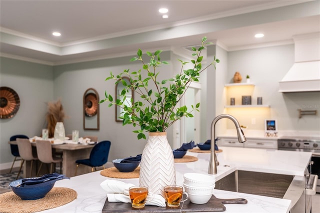 dining area featuring ornamental molding and recessed lighting