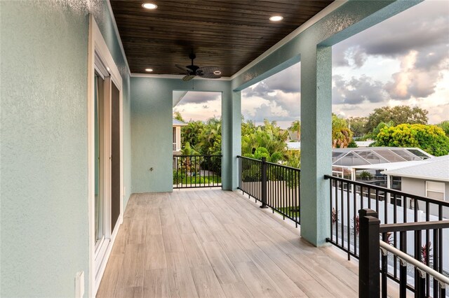 deck at dusk with ceiling fan