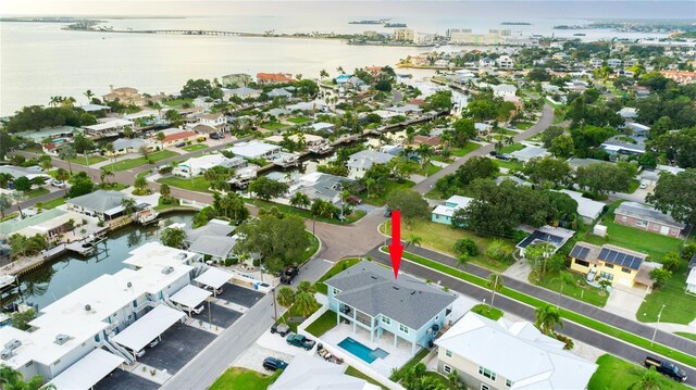 bird's eye view with a water view