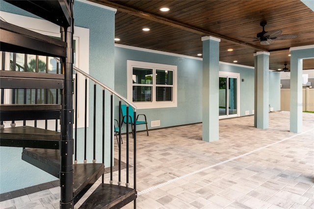 view of patio featuring a ceiling fan