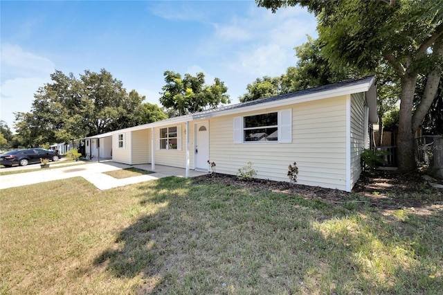 ranch-style home with a front yard