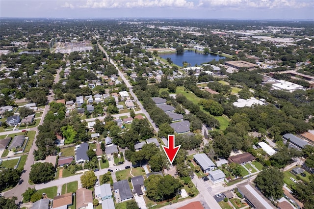 aerial view with a residential view and a water view