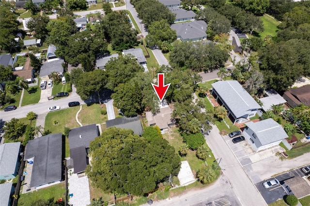 birds eye view of property with a residential view