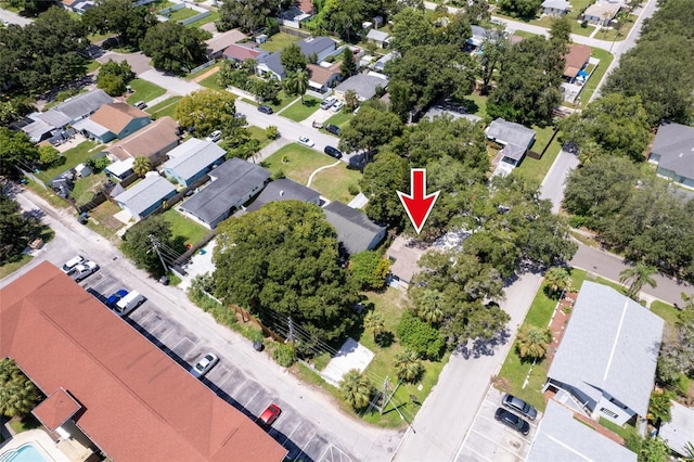 birds eye view of property with a residential view