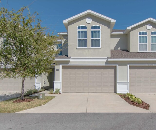 view of front of property with a garage