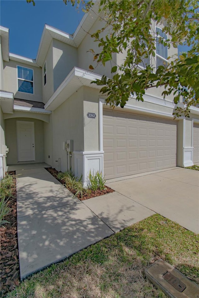 view of front of property with a garage