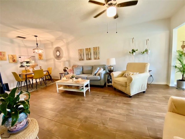 living room with ceiling fan