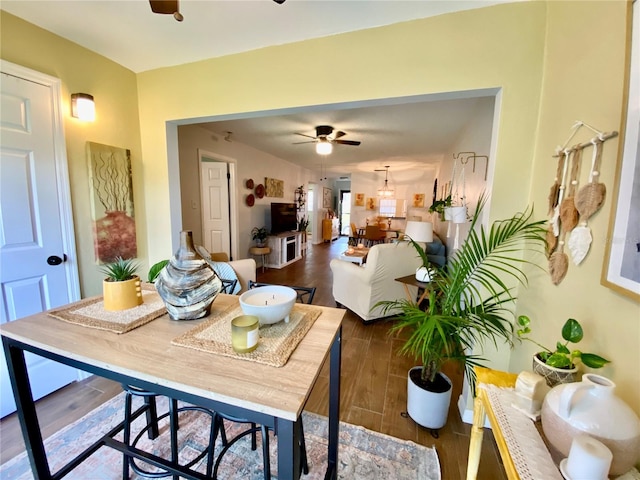 dining space featuring ceiling fan and wood-type flooring