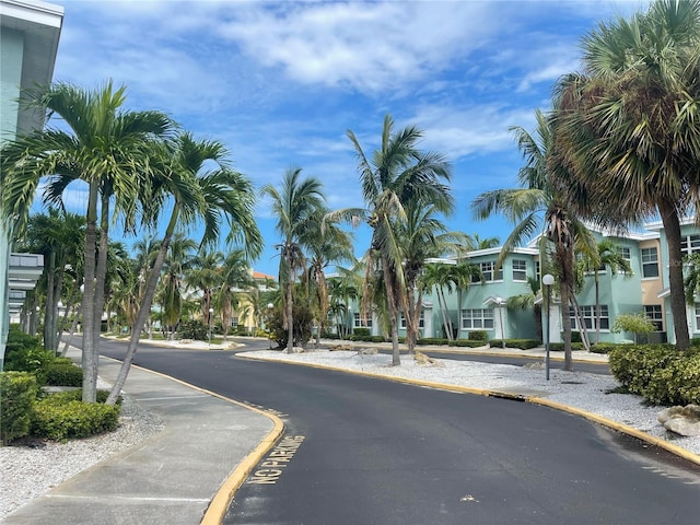 view of street with curbs