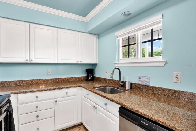 kitchen featuring stainless steel dishwasher, white cabinets, sink, and crown molding