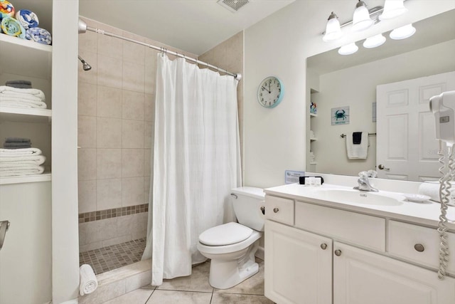 bathroom featuring toilet, tile patterned flooring, a shower with curtain, and vanity