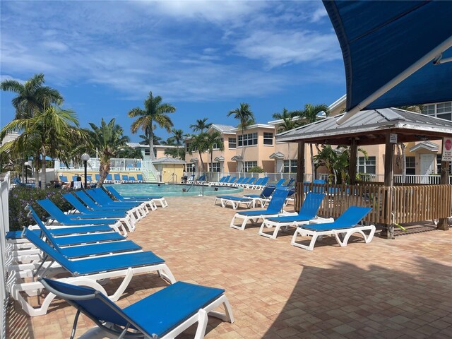 view of pool with a gazebo and a patio