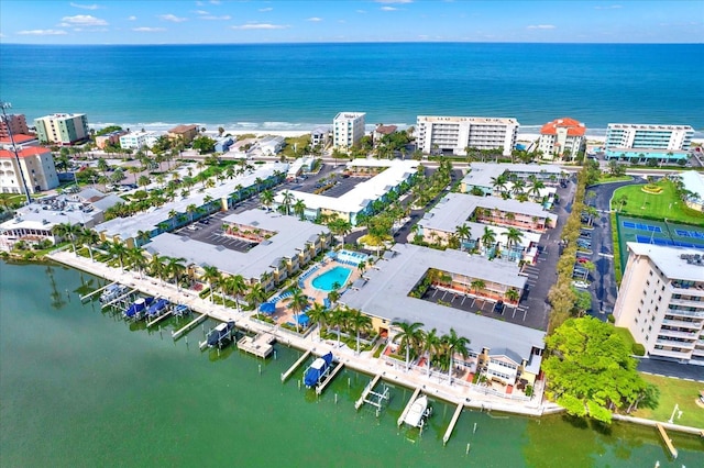 drone / aerial view with a view of city and a water view