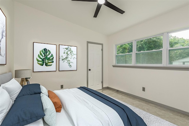 bedroom with lofted ceiling and ceiling fan