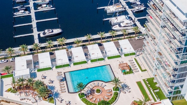 birds eye view of property with a water view