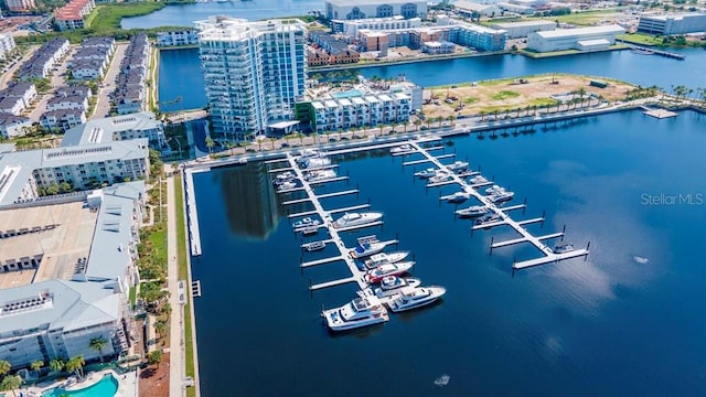 birds eye view of property with a water view