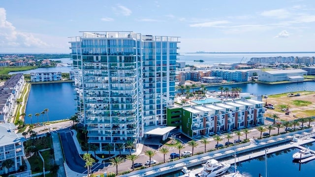 birds eye view of property featuring a water view