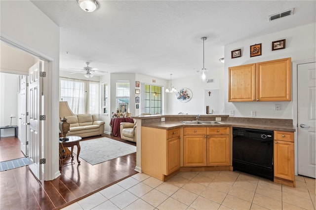 612 Terrace Ridge Cir Unit 612, Davenport, FL 33896 - kitchen featuring dishwasher, a sink, open floor plan, a peninsula, and ceiling fan