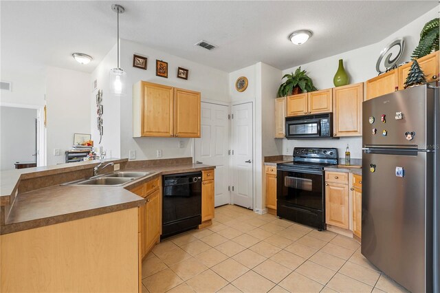 kitchen with decorative light fixtures, sink, black appliances, light brown cabinets, and light tile patterned floors