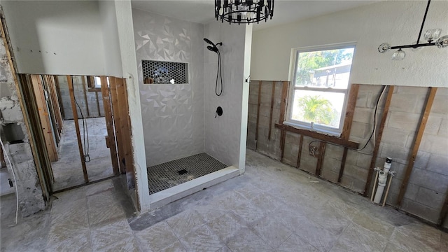 full bathroom with tiled shower