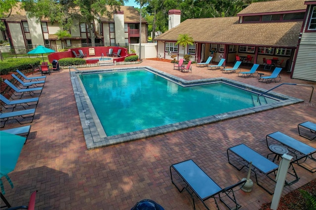 view of swimming pool featuring a patio