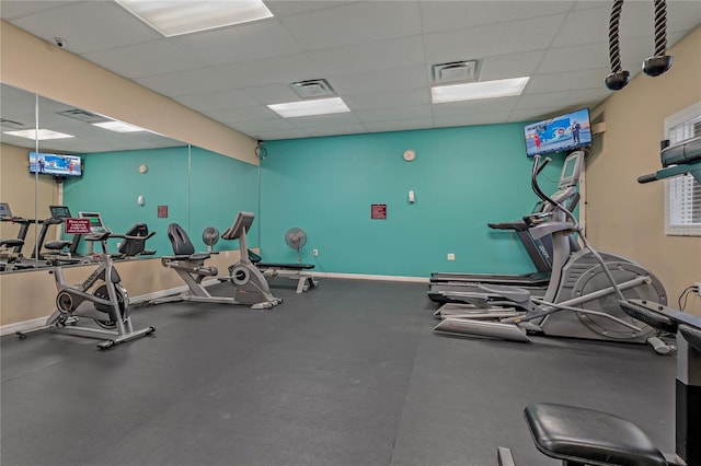 gym with a drop ceiling