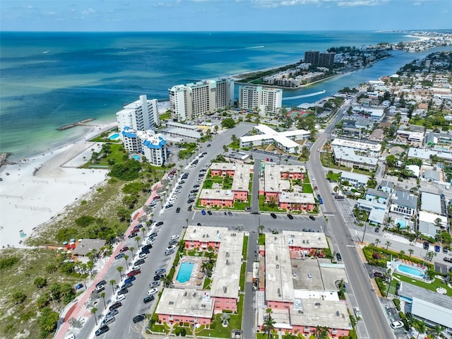 aerial view with a water view and a view of the beach