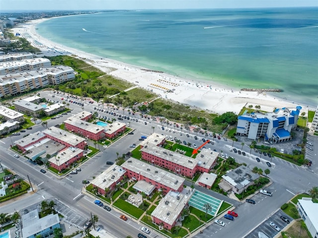 aerial view with a view of the beach and a water view