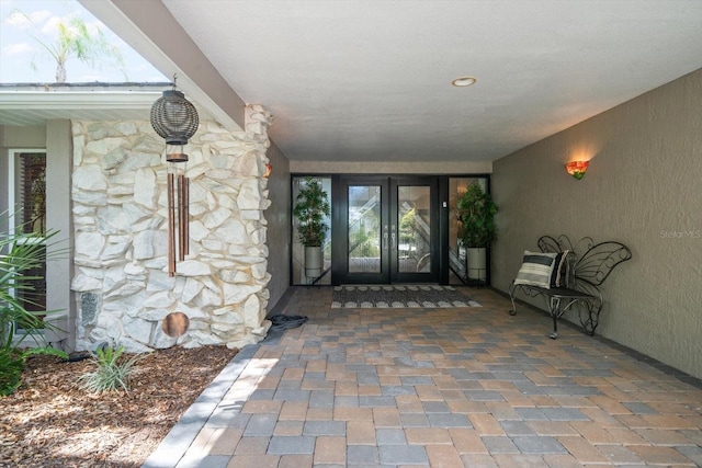 doorway to property featuring french doors