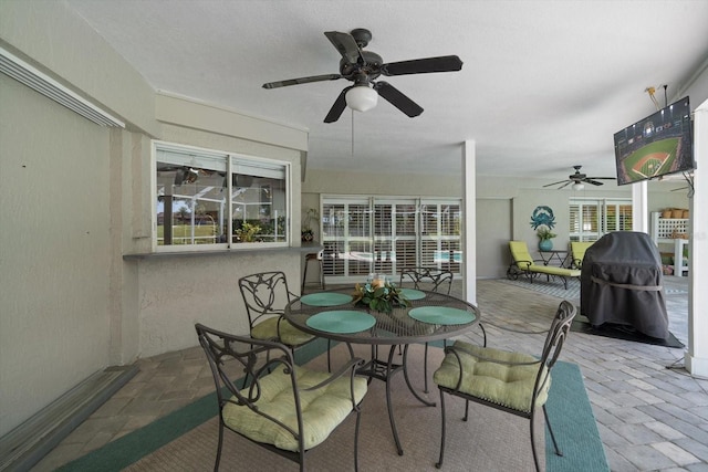 interior space featuring ceiling fan