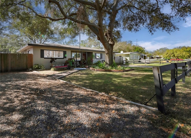 exterior space with a front lawn