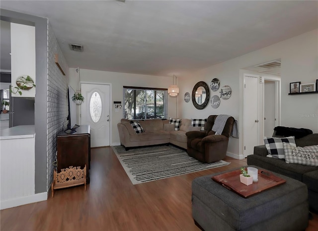 living room with dark hardwood / wood-style floors