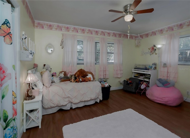 bedroom with dark wood-type flooring and ceiling fan