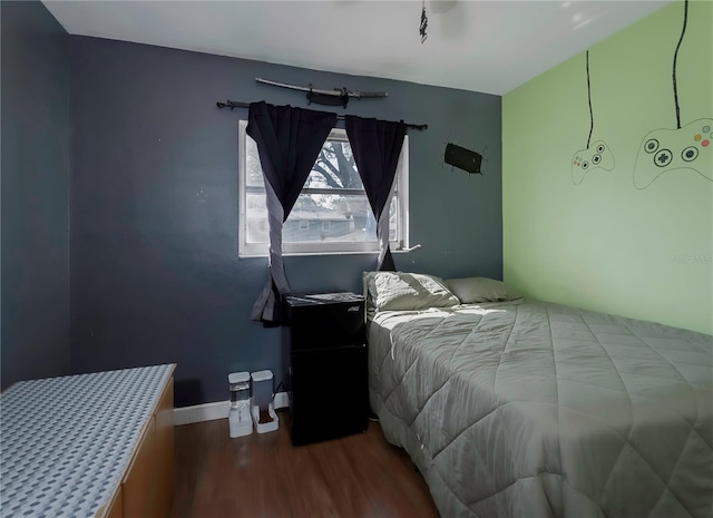 bedroom with wood-type flooring