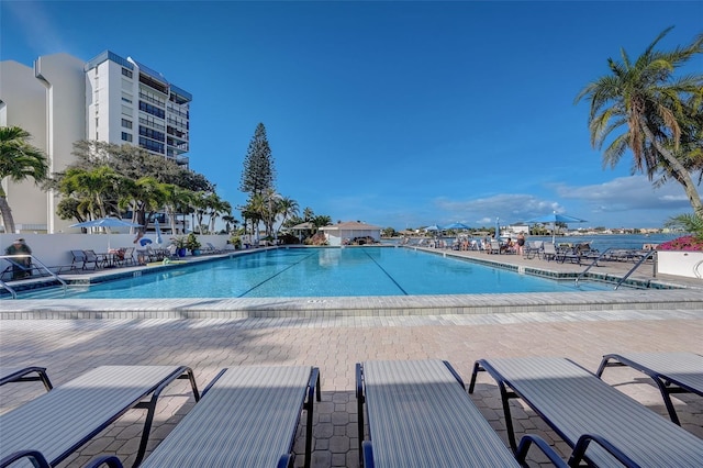 community pool with a patio