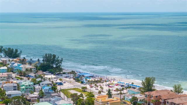 aerial view with a water view, a residential view, and a view of the beach