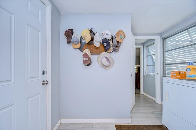 interior space featuring light hardwood / wood-style floors and washer / clothes dryer