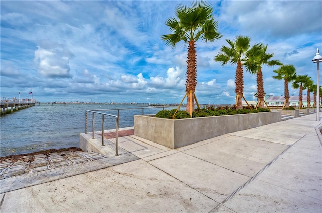 dock area featuring a water view